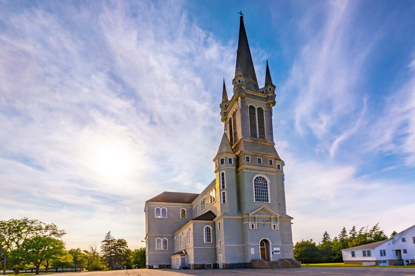 An image of St. Mary's Church with a cloudy blue sky.